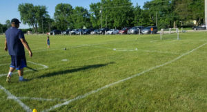 Toddler playing soccer